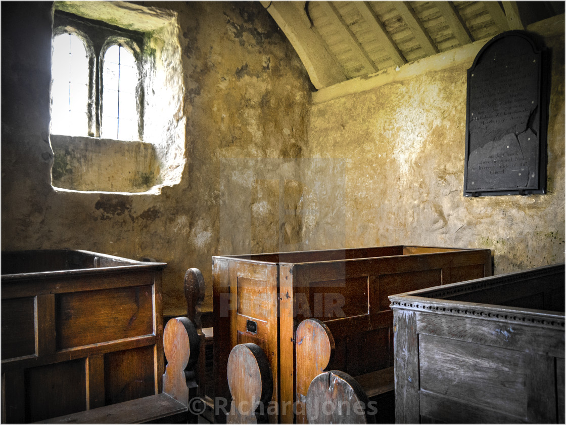 "Llanfaglan church pews" stock image