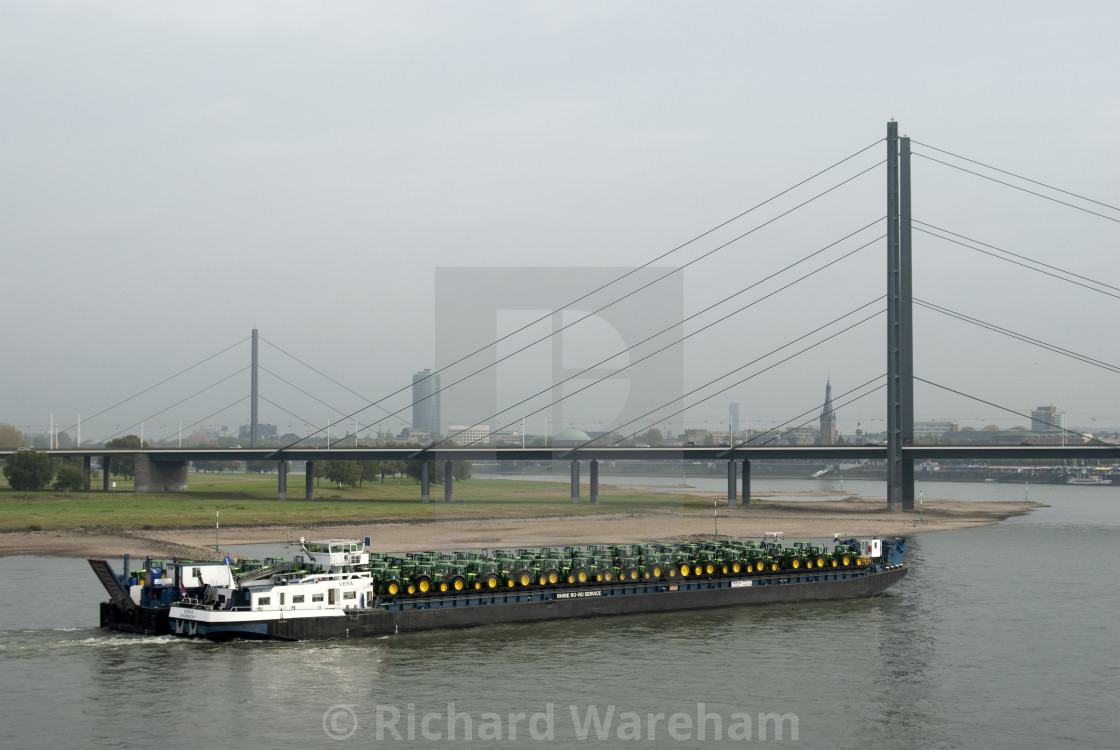 "Dusseldorf Germany Inland ship transporting tractors. Düsseldorf..." stock image