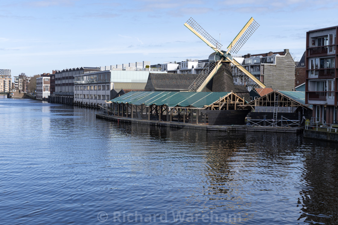 "Amsterdam The Netherlands 18th March 2024 Windmill “de otter” paltrok mill sawmill, one of the oldest of its type in the country. houtzaagmolen, molen, paltrokmolen" stock image
