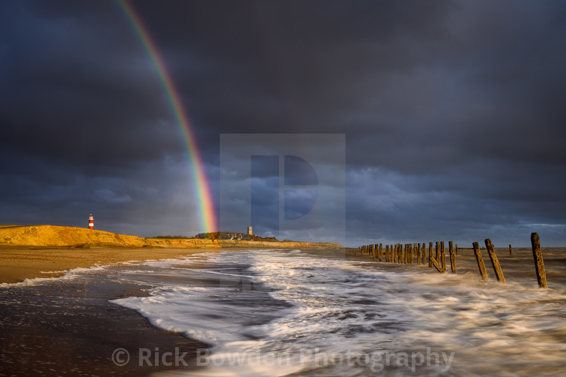 "Happisburgh Beach Rainbow" stock image