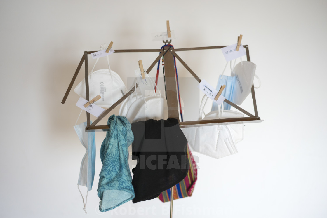 "Covid 19 masks drying on a music stand" stock image