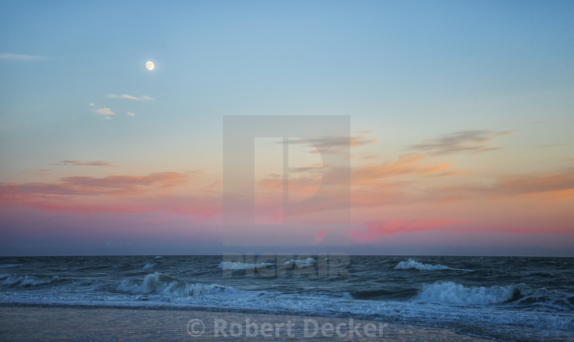 "The Moon and Sunset Over the Atlatnic Ocean" stock image