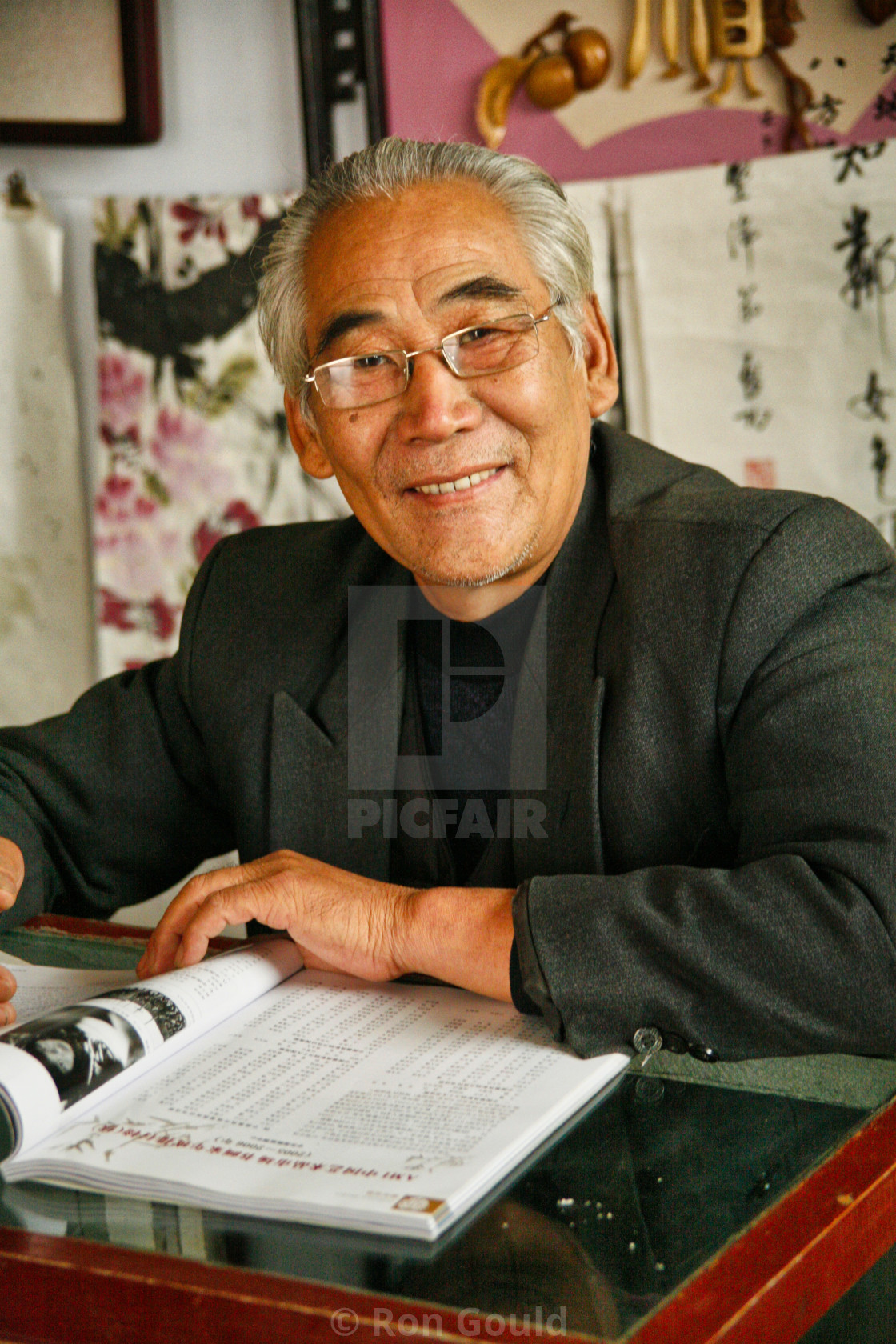 "China, Calligrapher in his shop" stock image