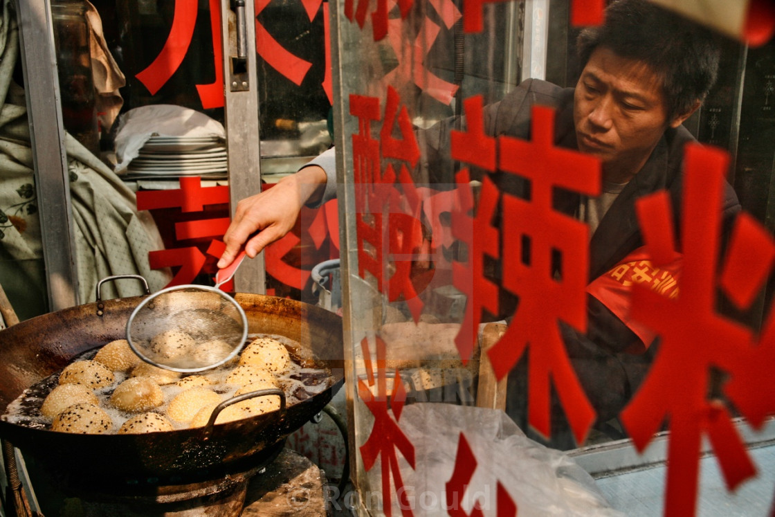 "Man cooking dumplings" stock image