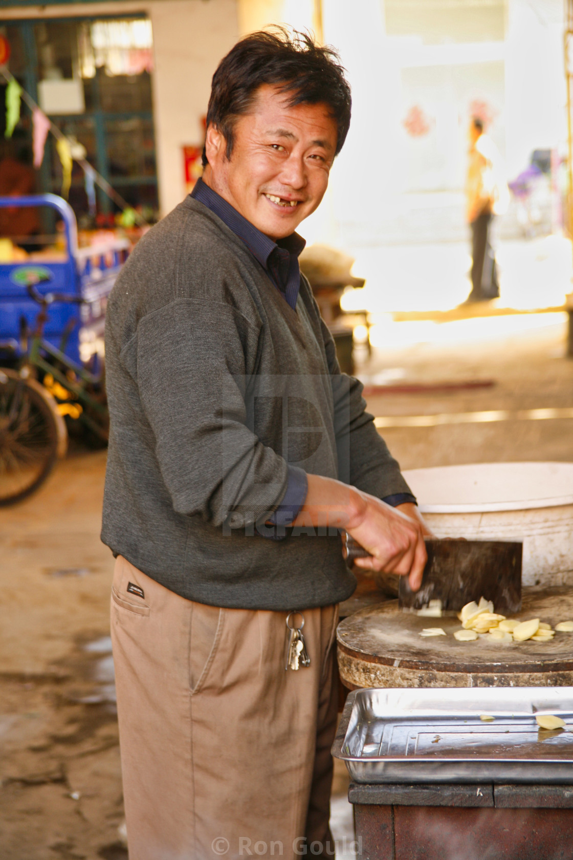 "Man cutting food" stock image