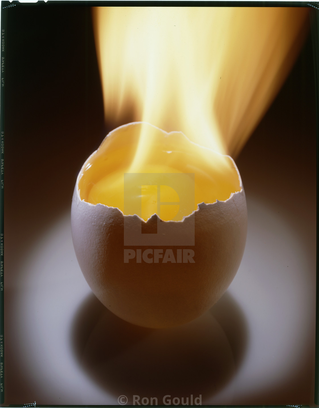 "Egg on fire" stock image