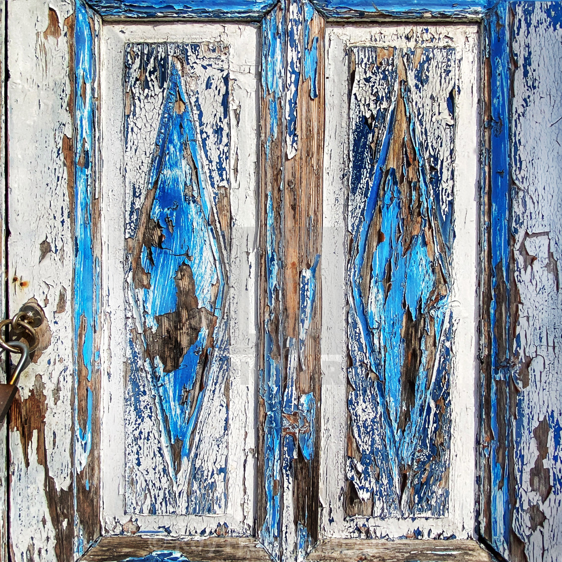 "Peeling paint on old door" stock image