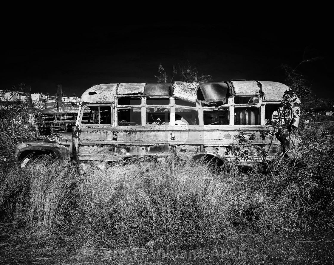 "Abandoned, derelict bus in mono" stock image