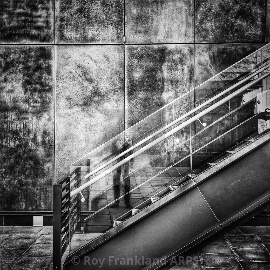 "Escalator and rusty wall - mono" stock image