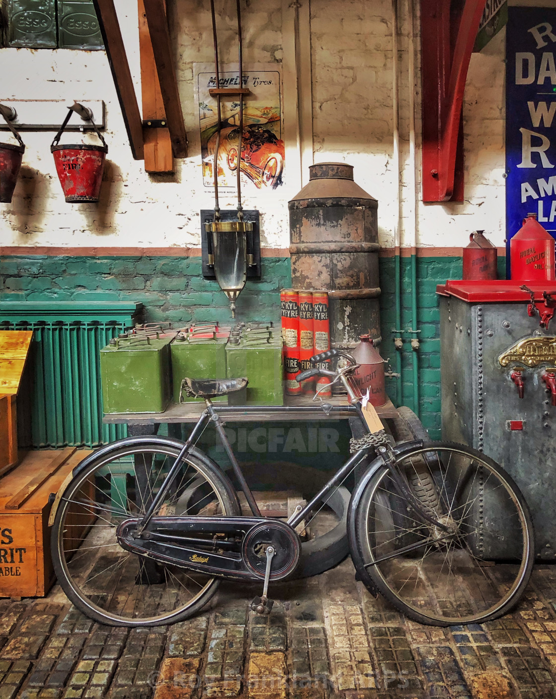 "Old bicycle in Victorian workshop" stock image