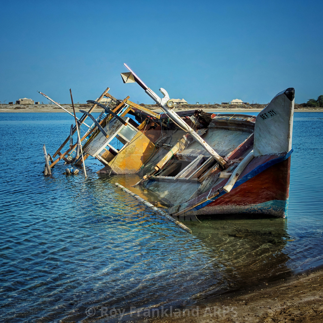 "Wrecked fishing boat in Fujairah" stock image