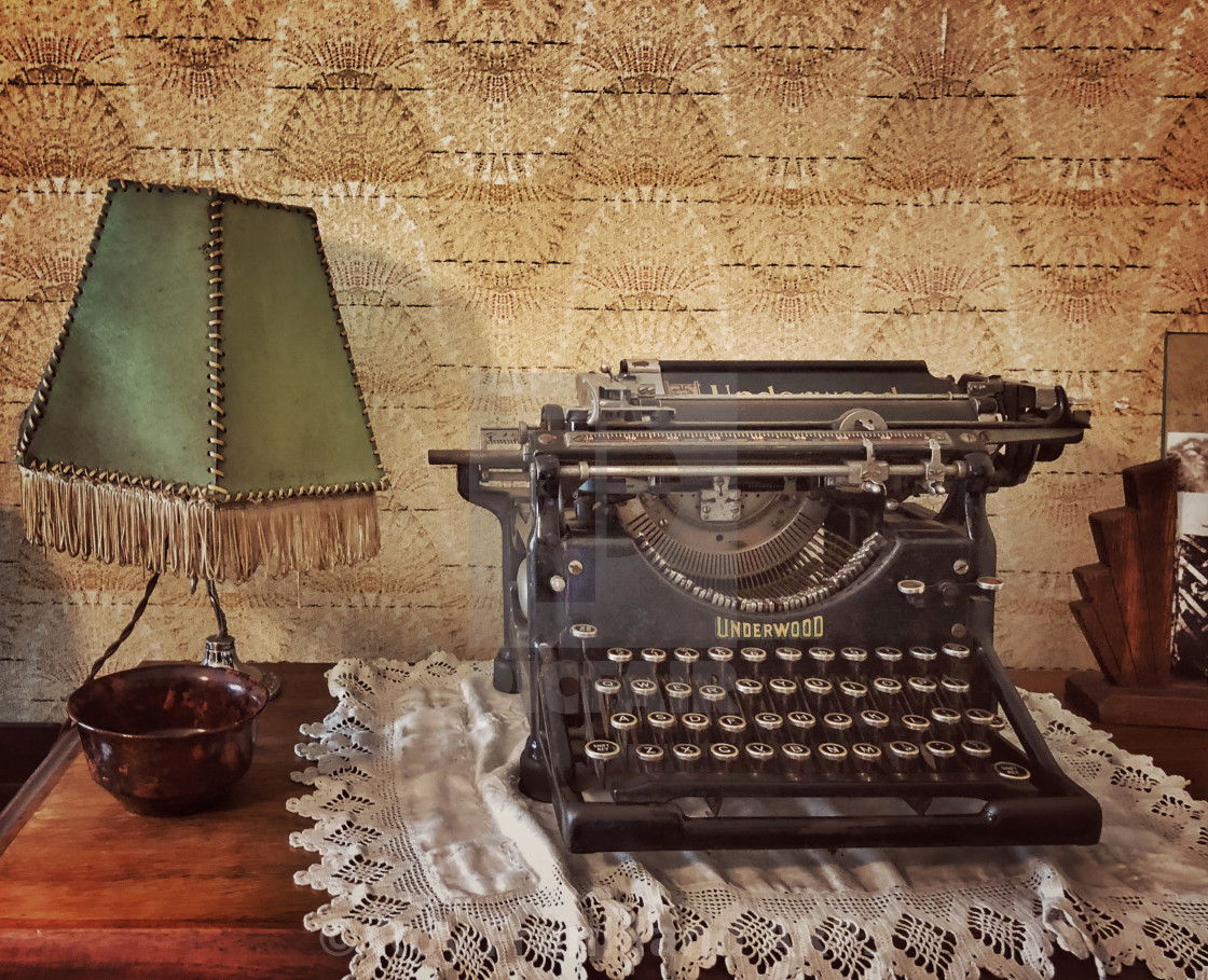 "Underwood typewriter with old lamp" stock image