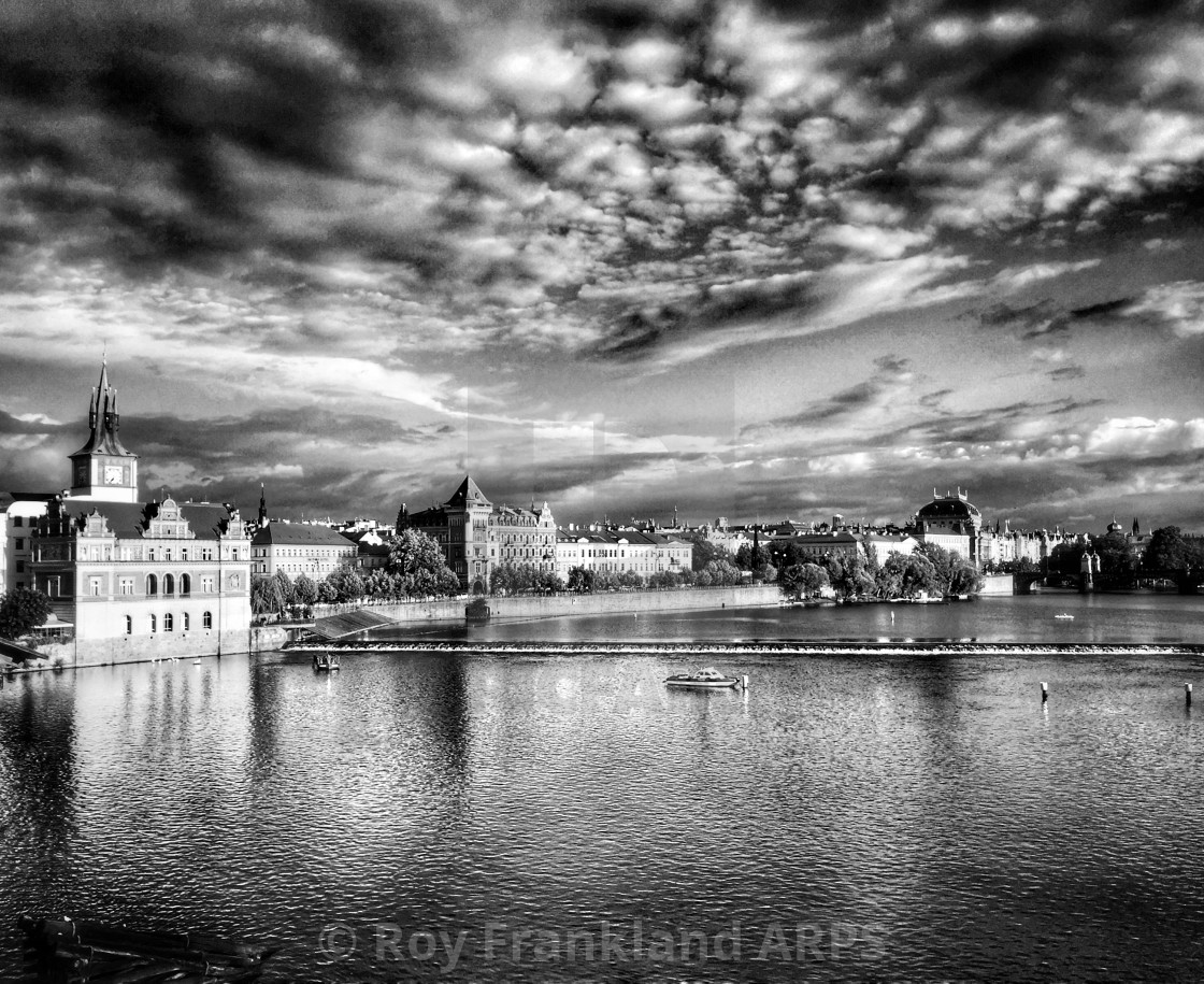 "Prague City reflected in the Vltava River, mono" stock image