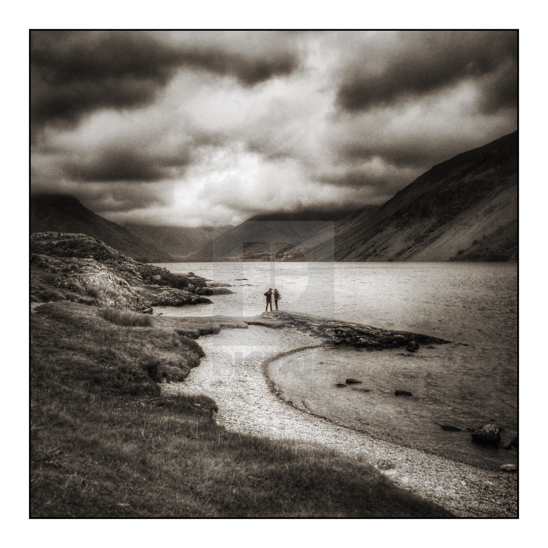 "People at Wastwater lake with storm clouds, mono toned" stock image