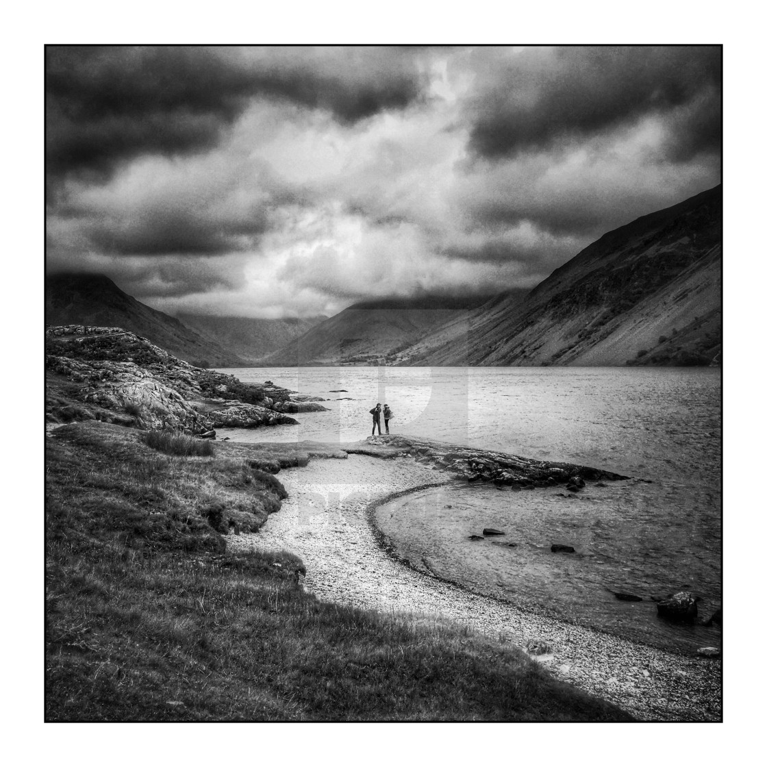 "People at Wastwater lake with storm clouds, mono" stock image