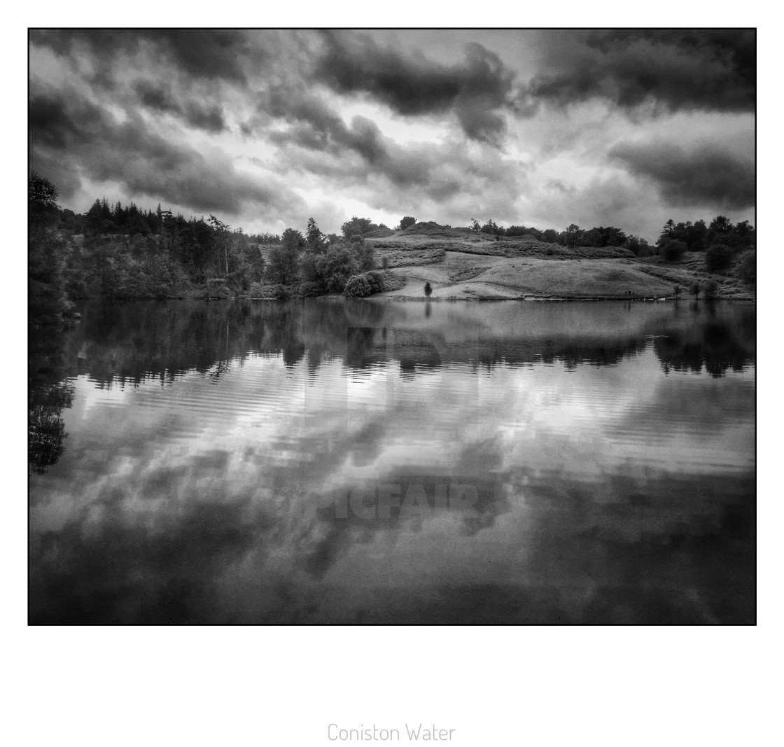 "Reflections in Coniston lake" stock image