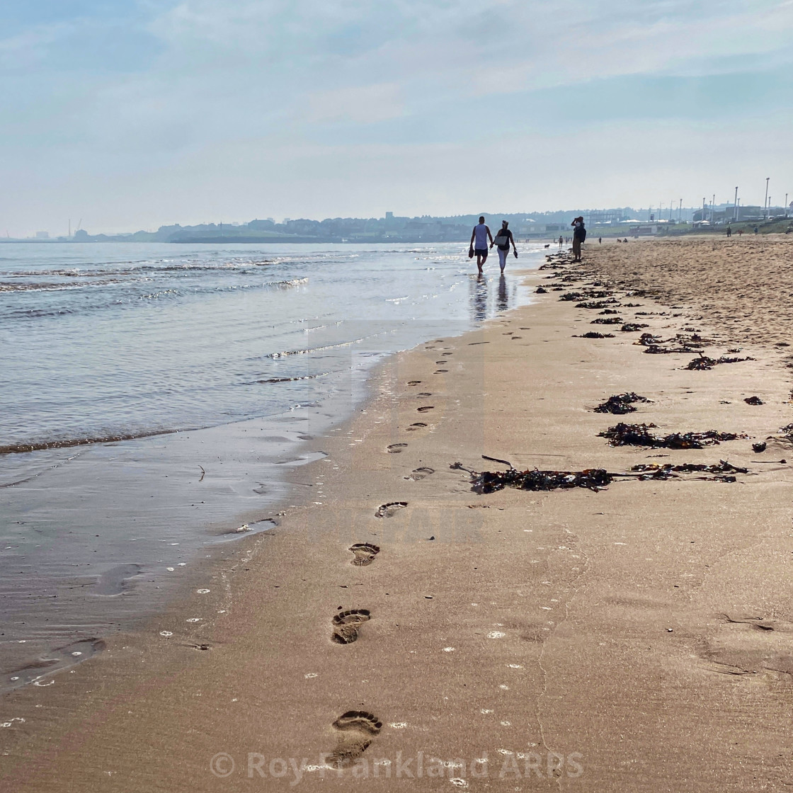 "Footsteps in the sand" stock image