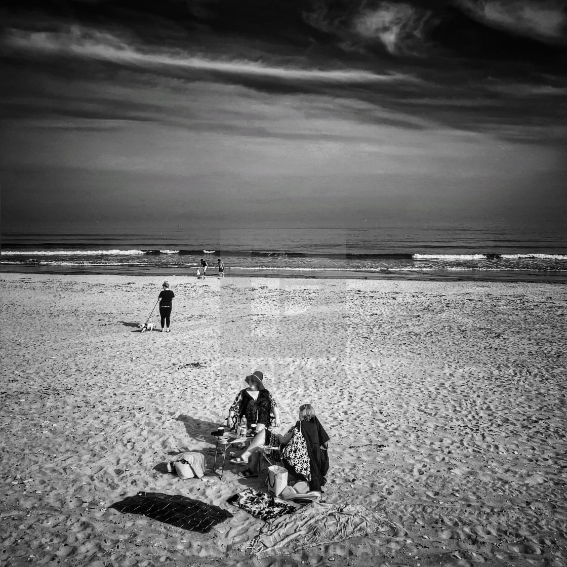 "Picnic on the beach, mono" stock image