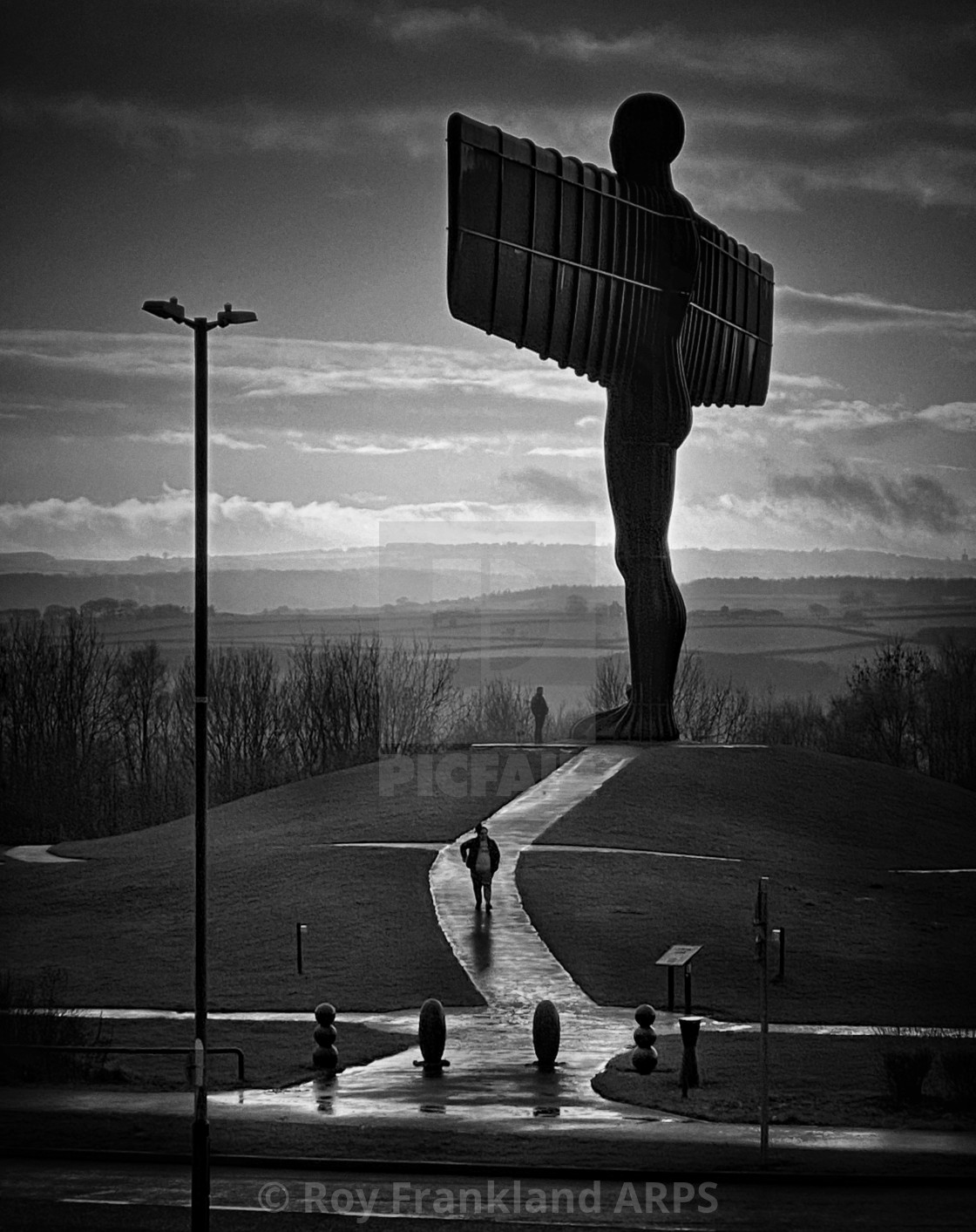 "Beneath the wings of the Angel, mono." stock image