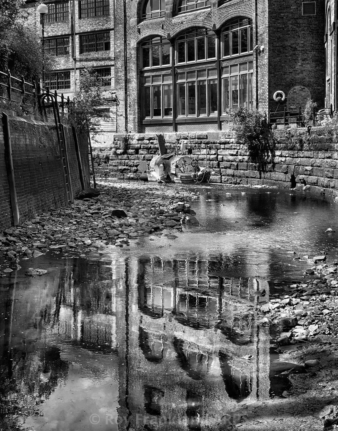 "Reflections in the Ouse burn, mono" stock image