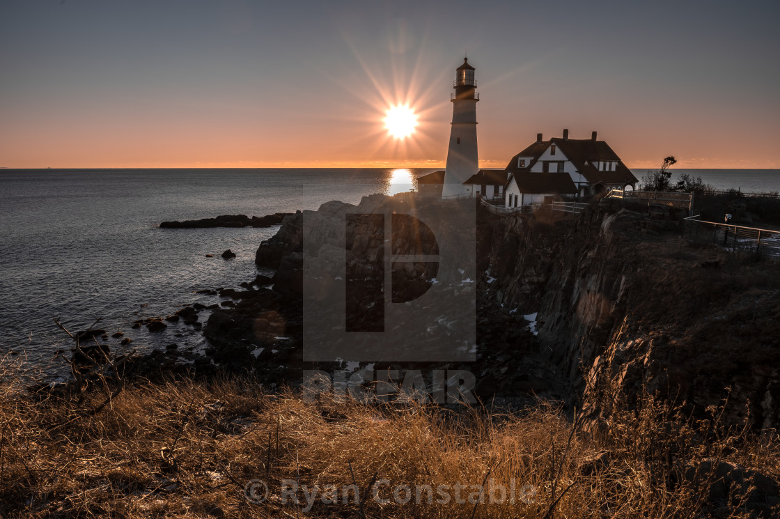 "Sun at Portland Headlight" by Ryan Constable - $15.31 "Sun at Portland Headlight" stock image