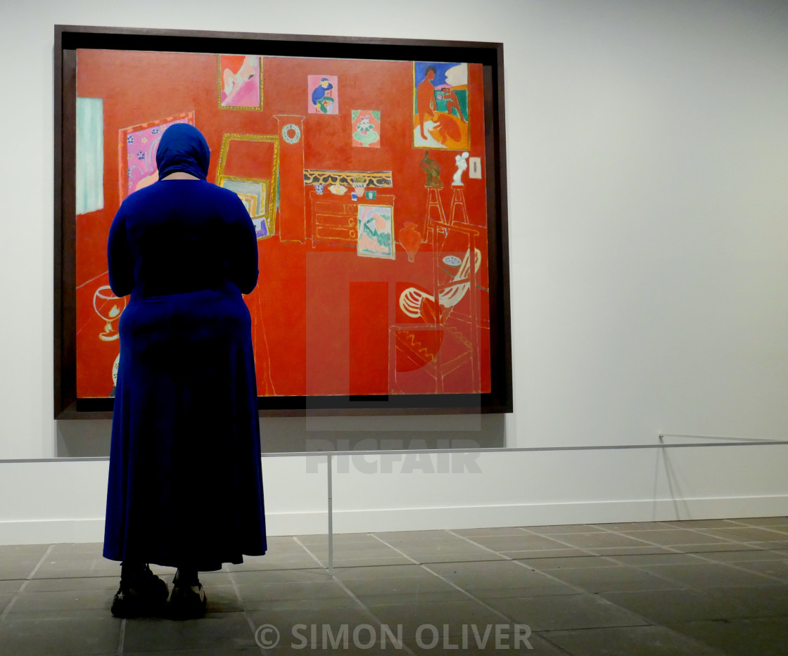 "Woman at an exhibition" stock image