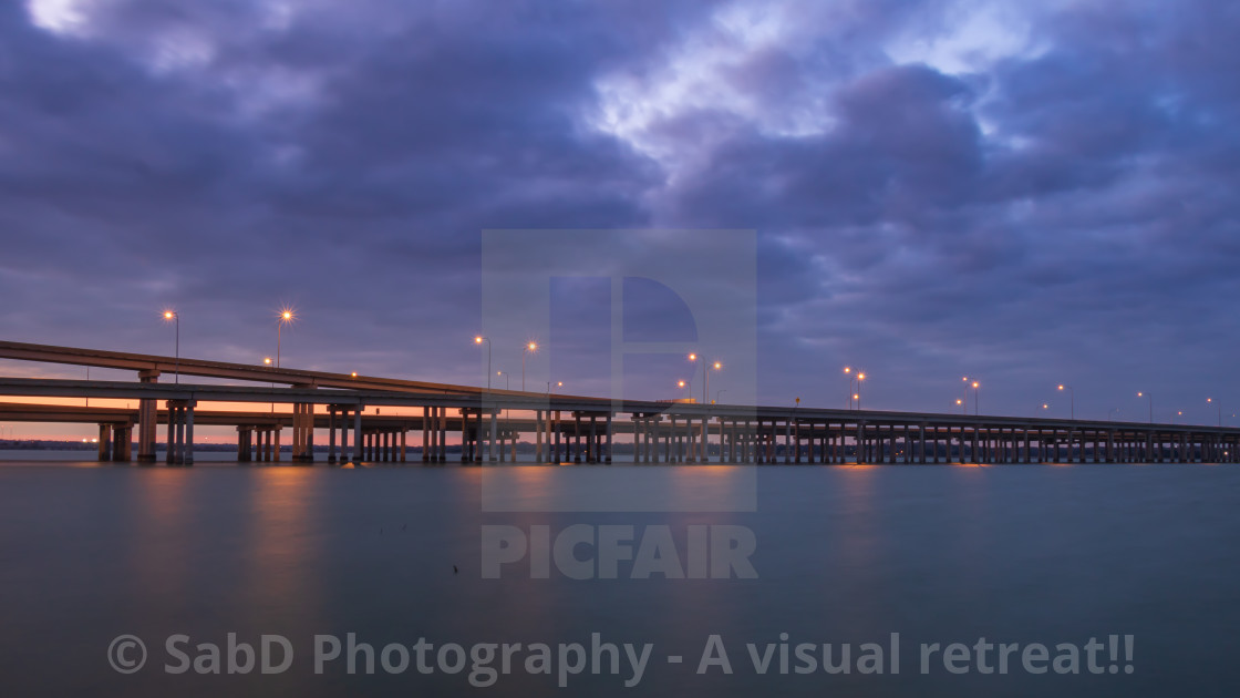 "Stunning Bridge at Sunset with dramatic clouds" stock image