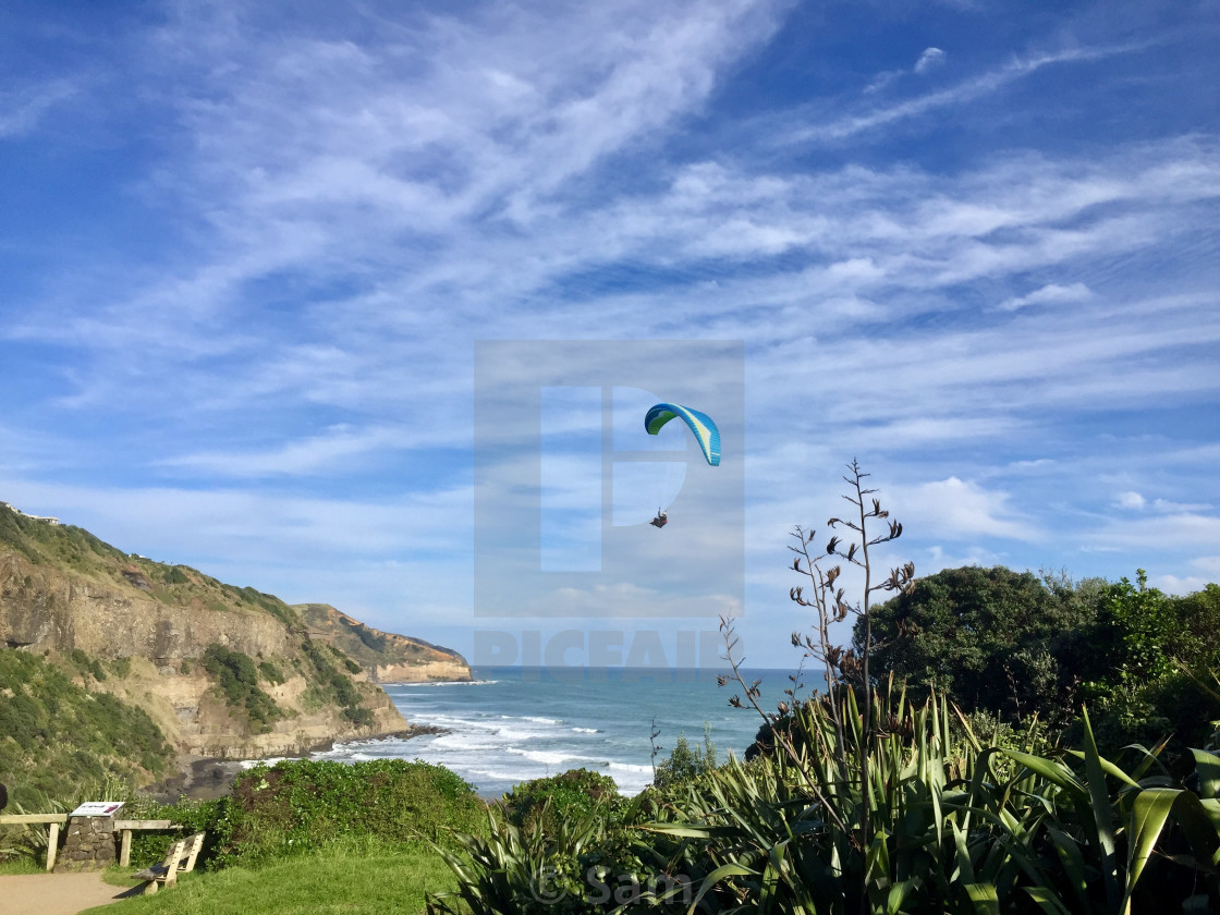 "Paragliding Into Stillness" by Sam - $19.93 "Paragliding Into Stillness" stock image