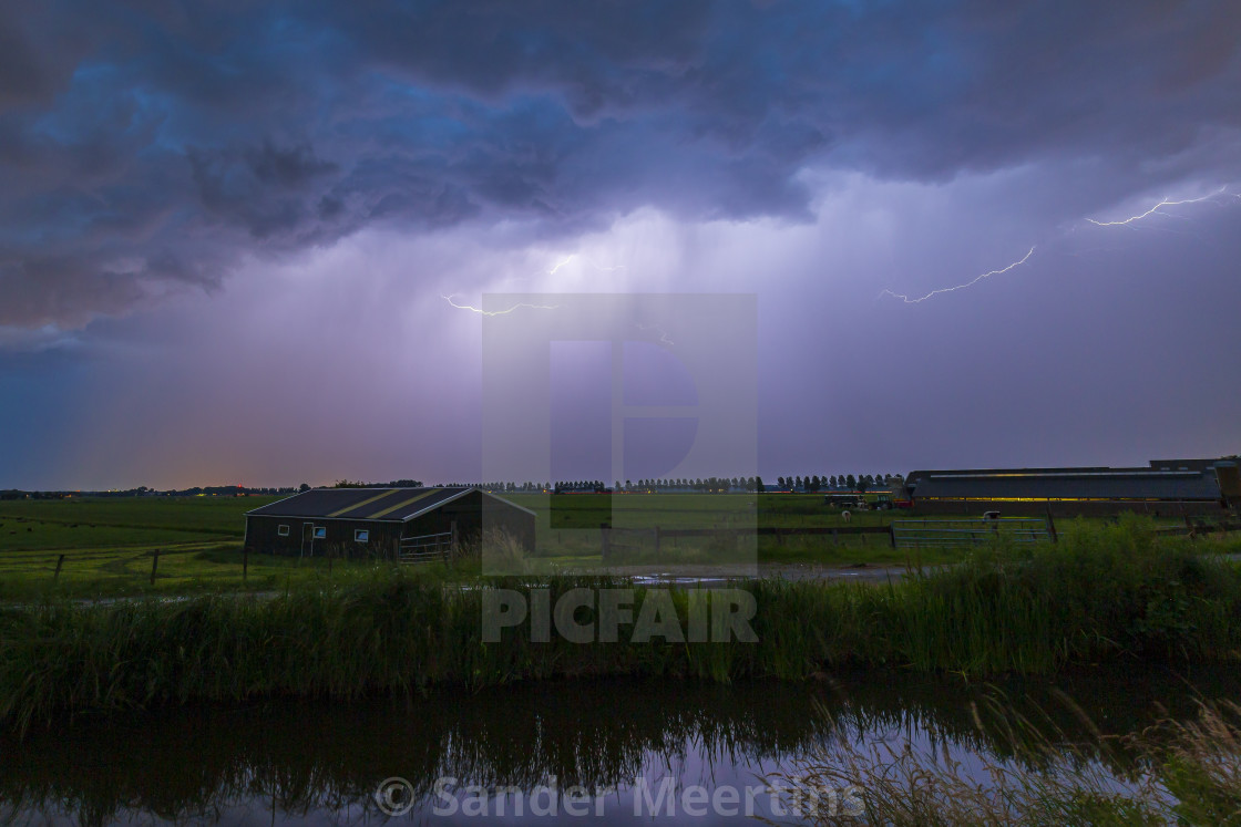 "Close lighting strike in farmland" by Sander Meertins - $5.36 "Close lighting strike in farmland" stock image