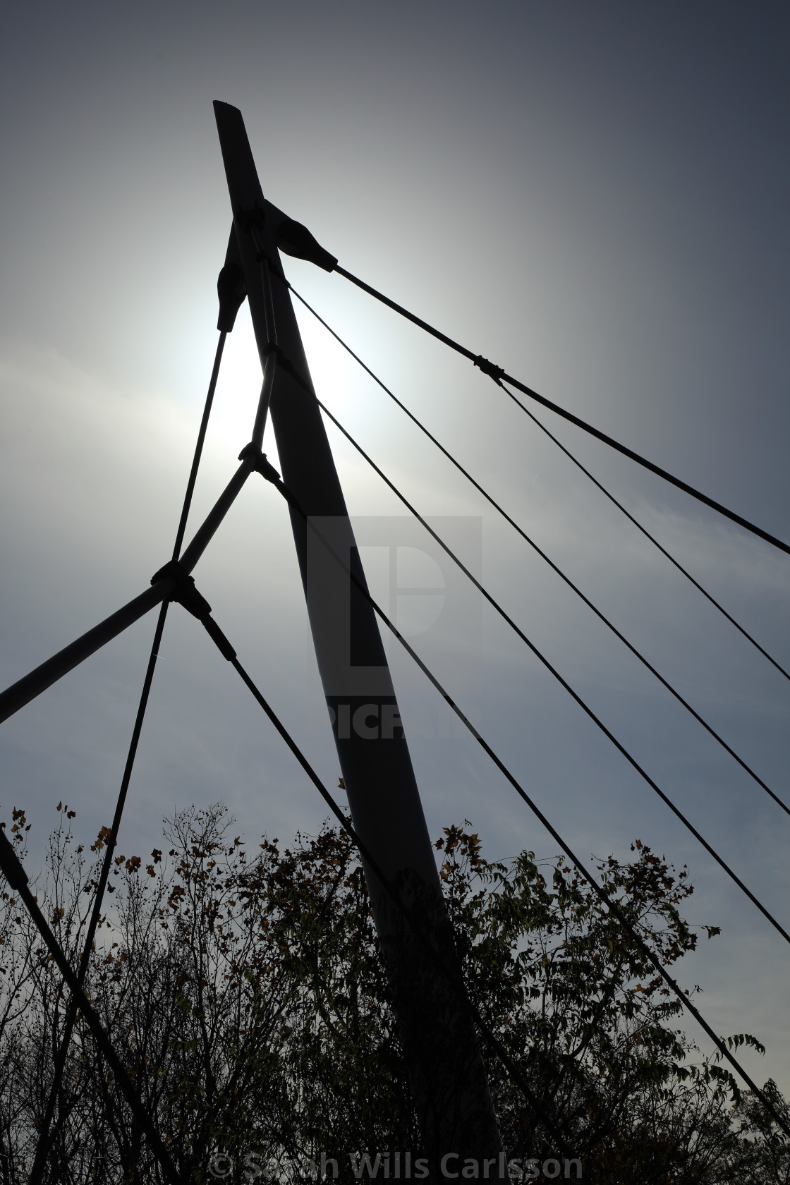 "Silhouette of Falls Park Pedestrian Bridge" stock image