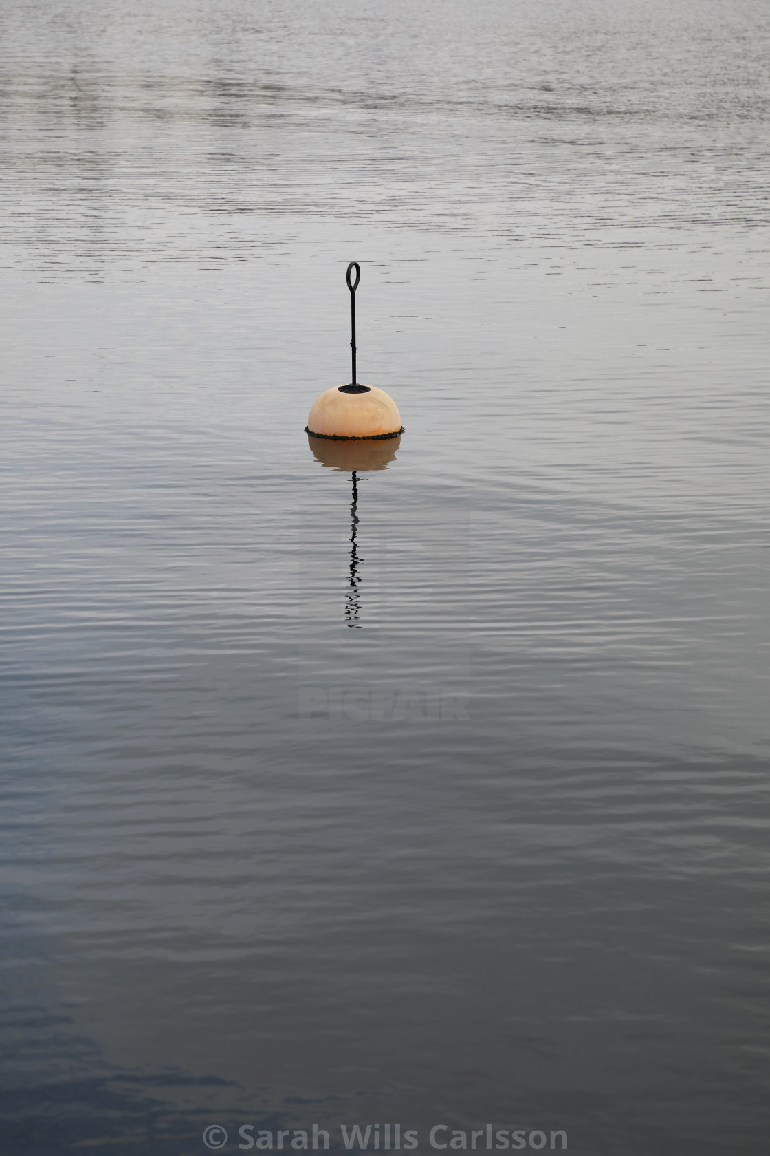 "Mooring Buoy in Evening Sky" stock image