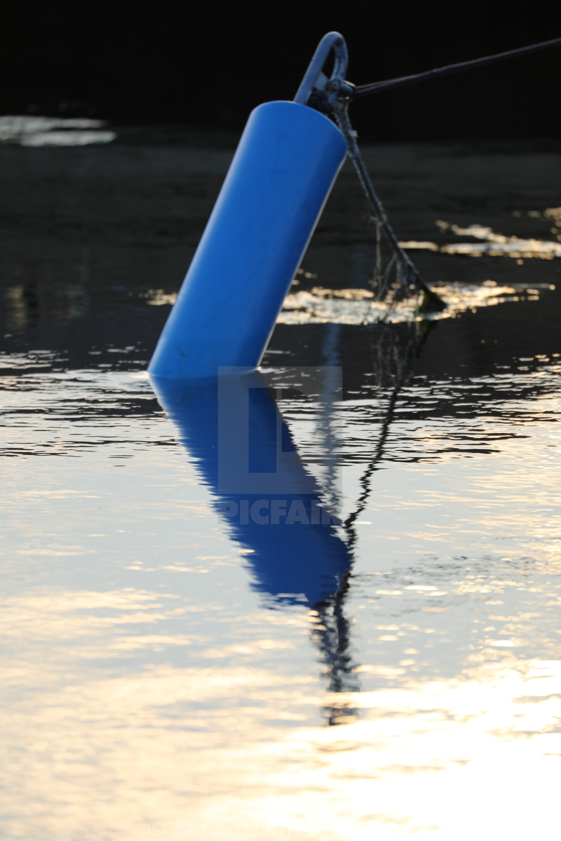 "Mooring Buoy Reflected in Evening Sky" stock image