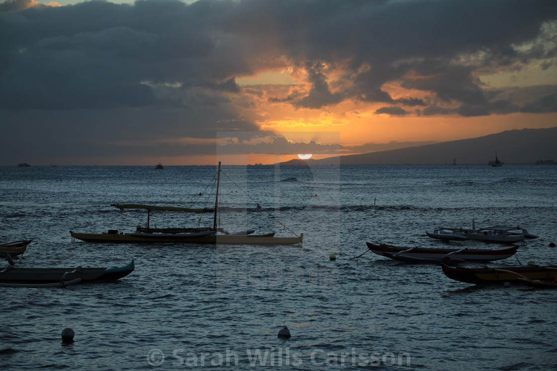 "Sunset at Waikiki Beach" stock image