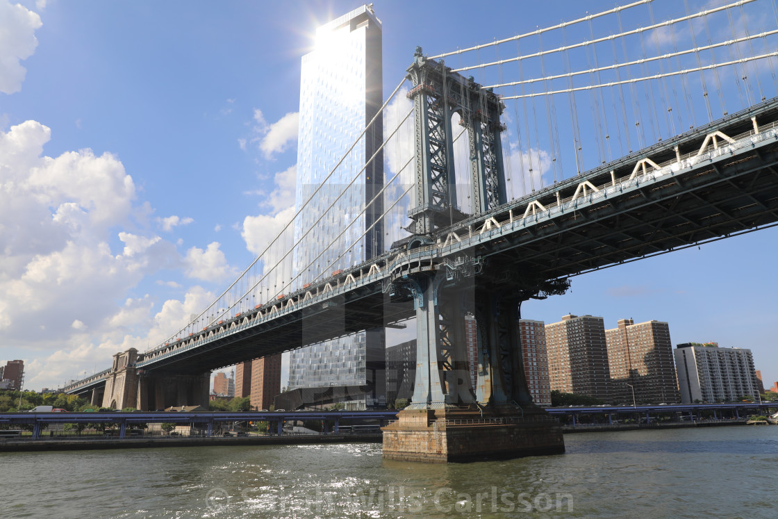 "New York City Bridge and Sunburst Skyscraper" stock image