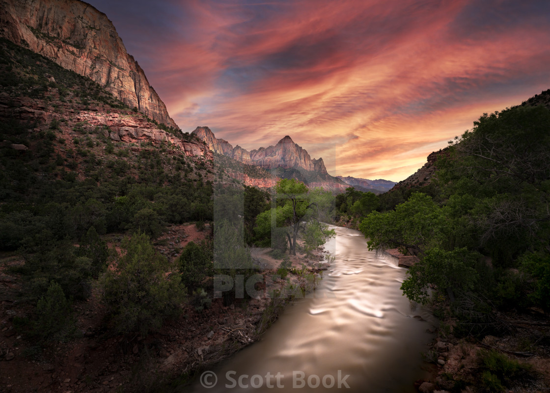 "River Flows Through a Canyon at Sunset" stock image