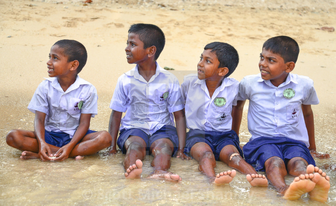 "Sri Lankan schoolboys on a beach" by Scott Michael Shanley - £12.40 "Sri Lankan schoolboys on a beach" stock image