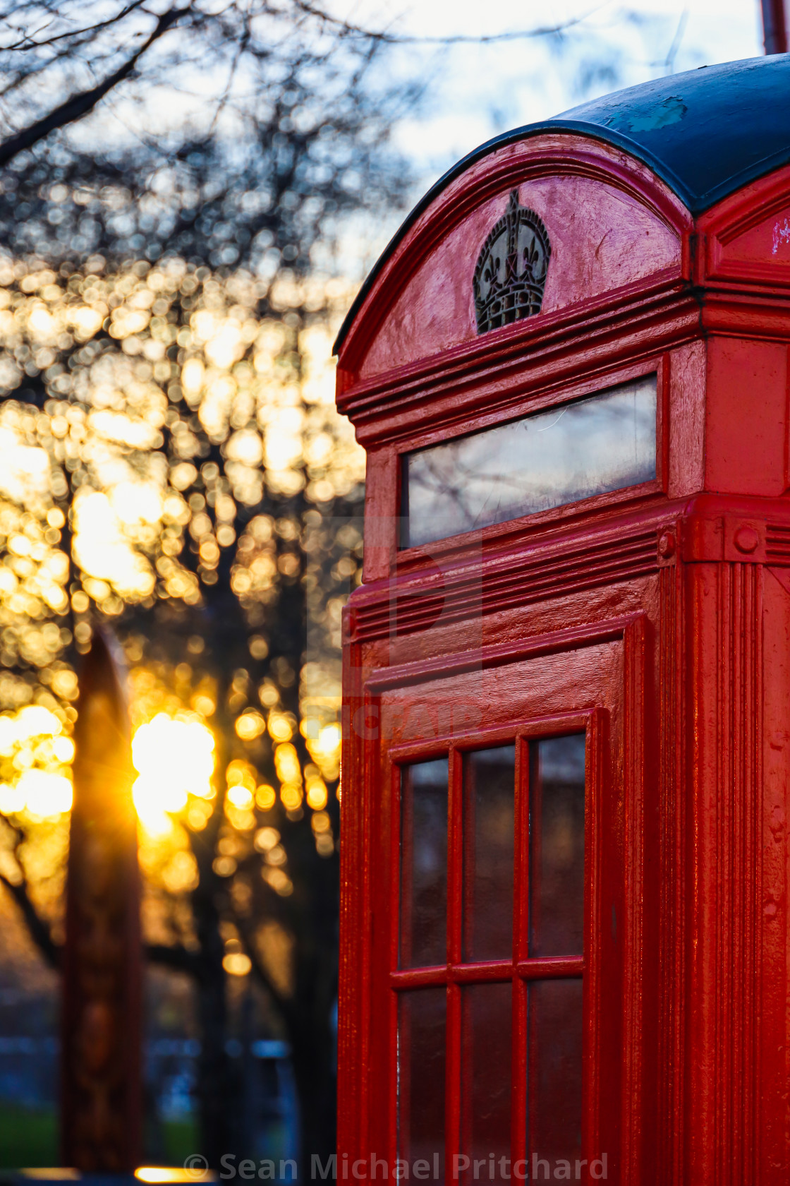 "Vintage Phone Box sunset" by Sean Michael Pritchard - £14.99 "Vintage Phone Box sunset" stock image