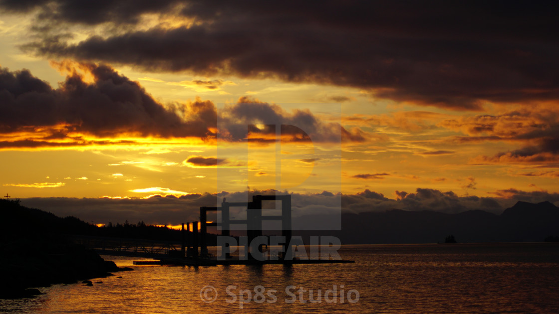 "Sunset near a float plane dock" stock image