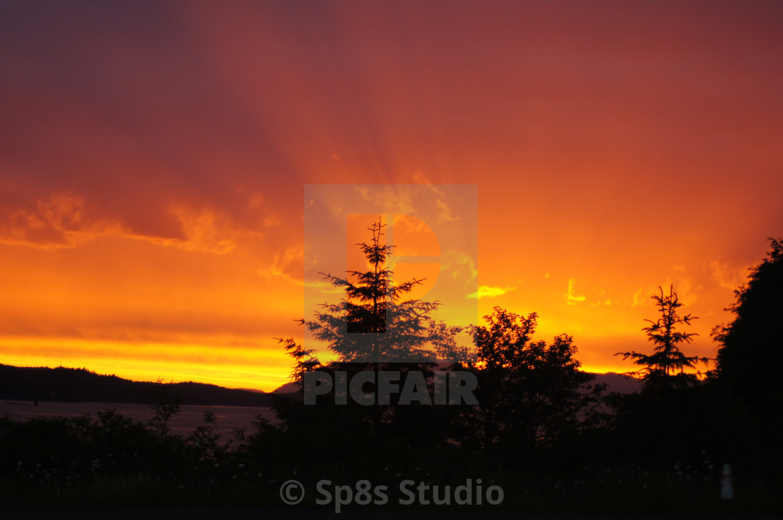 "Sunset with sun rays" stock image