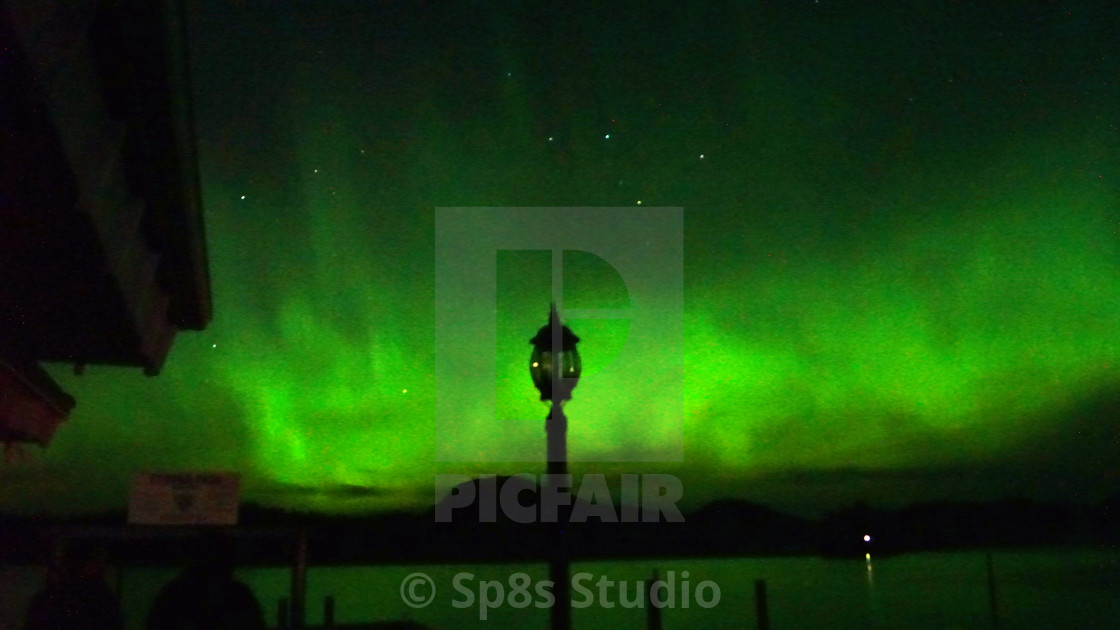 "Lamppost with Northern lights" stock image