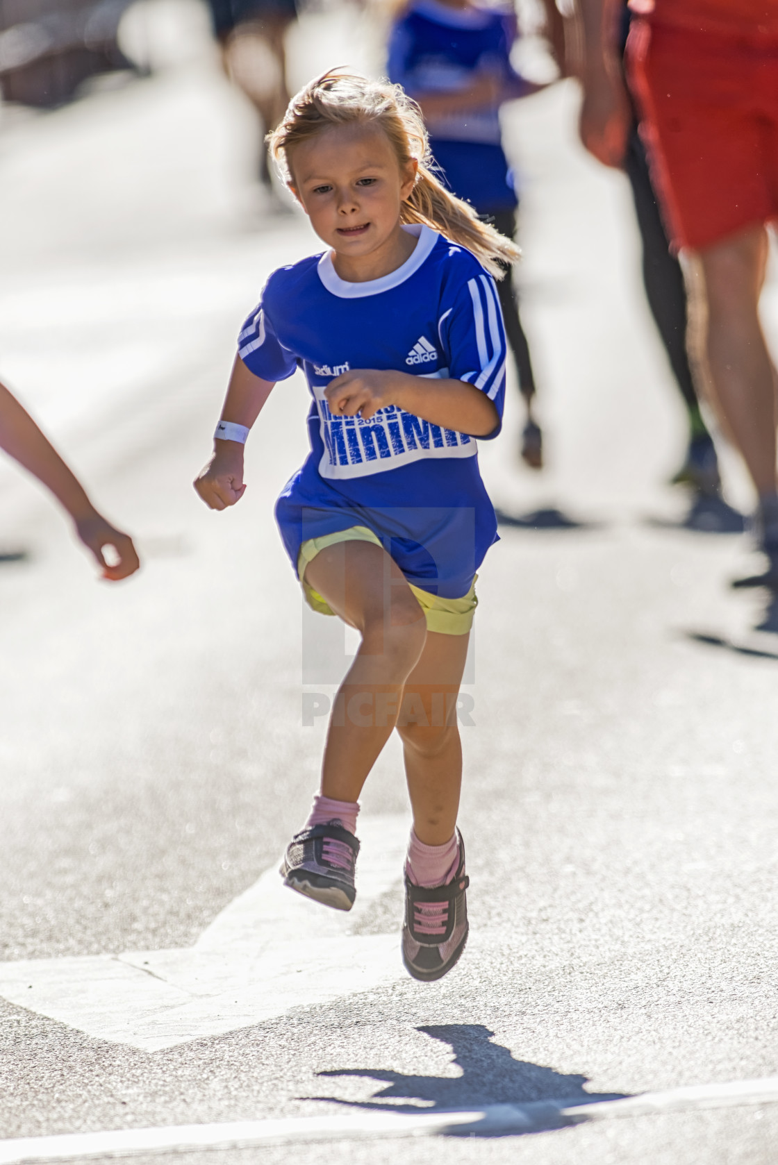 "Fast young girl almost flying at the Minimil for the youngest ru" by Stefan Holm - $6.35 "Fast young girl almost flying at the Minimil for the youngest ru" stock image