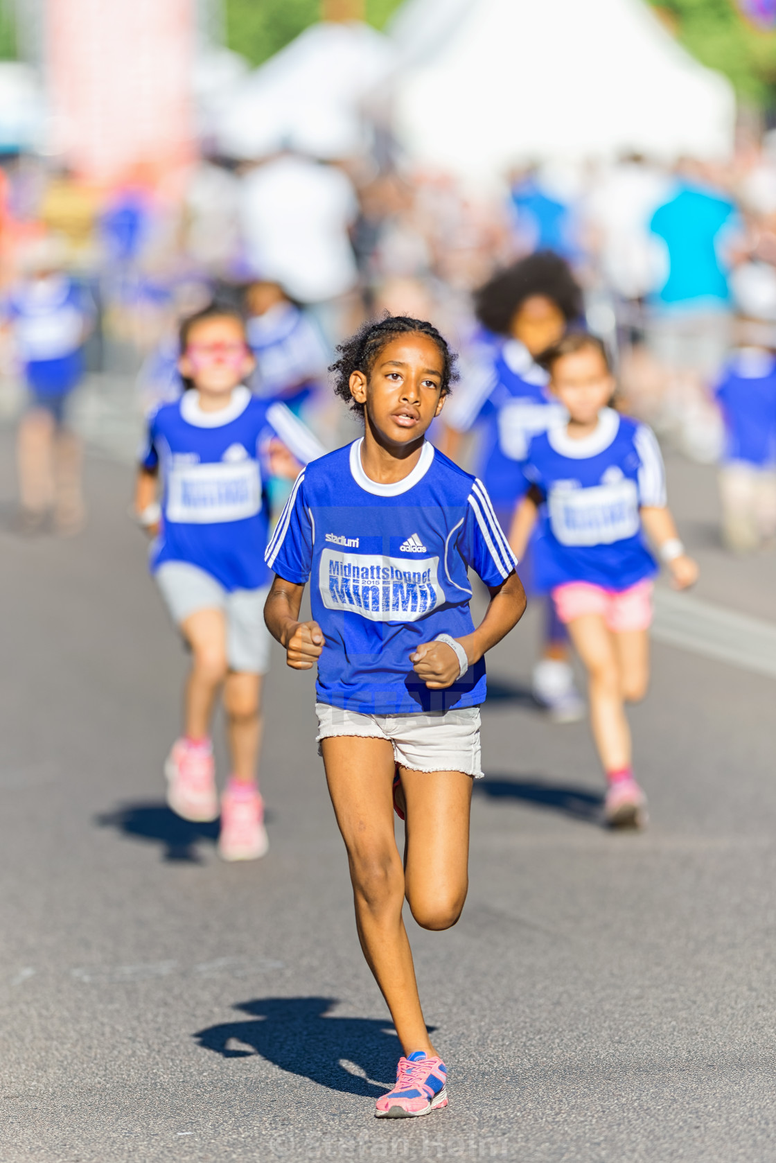 "Fast girl at the Minimil for the youngest runners at Midnattslop" by Stefan Holm - $6.32 "Fast girl at the Minimil for the youngest runners at Midnattslop" stock image