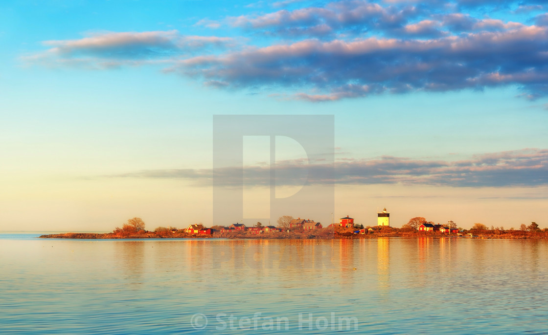 "Lighthouse in sunset" stock image