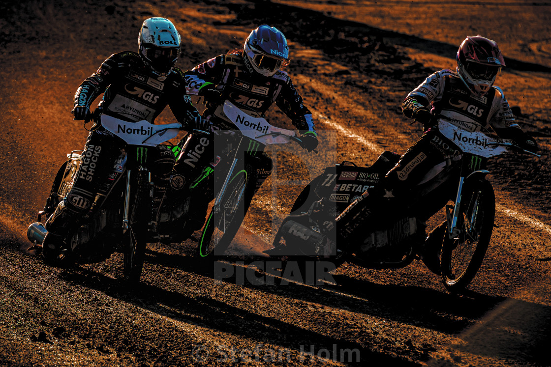 "Speedway racers in backlight during the start at the Speedway GP" by Stefan Holm - $6.29 "Speedway racers in backlight during the start at the Speedway GP" stock image