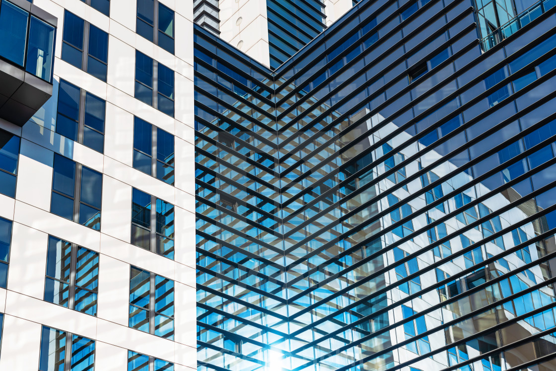 "View of the glass building Bundesrechenzentrum with reflections" by Stefan Holm - $6.34 "View of the glass building Bundesrechenzentrum with reflections" stock image