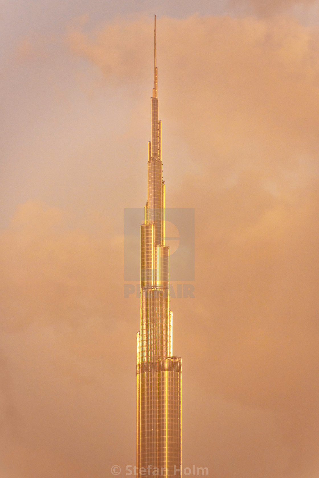 "Burj Khalifa during evening in orange color due to sand in dust" by Stefan Holm - $6.30 "Burj Khalifa during evening in orange color due to sand in dust" stock image