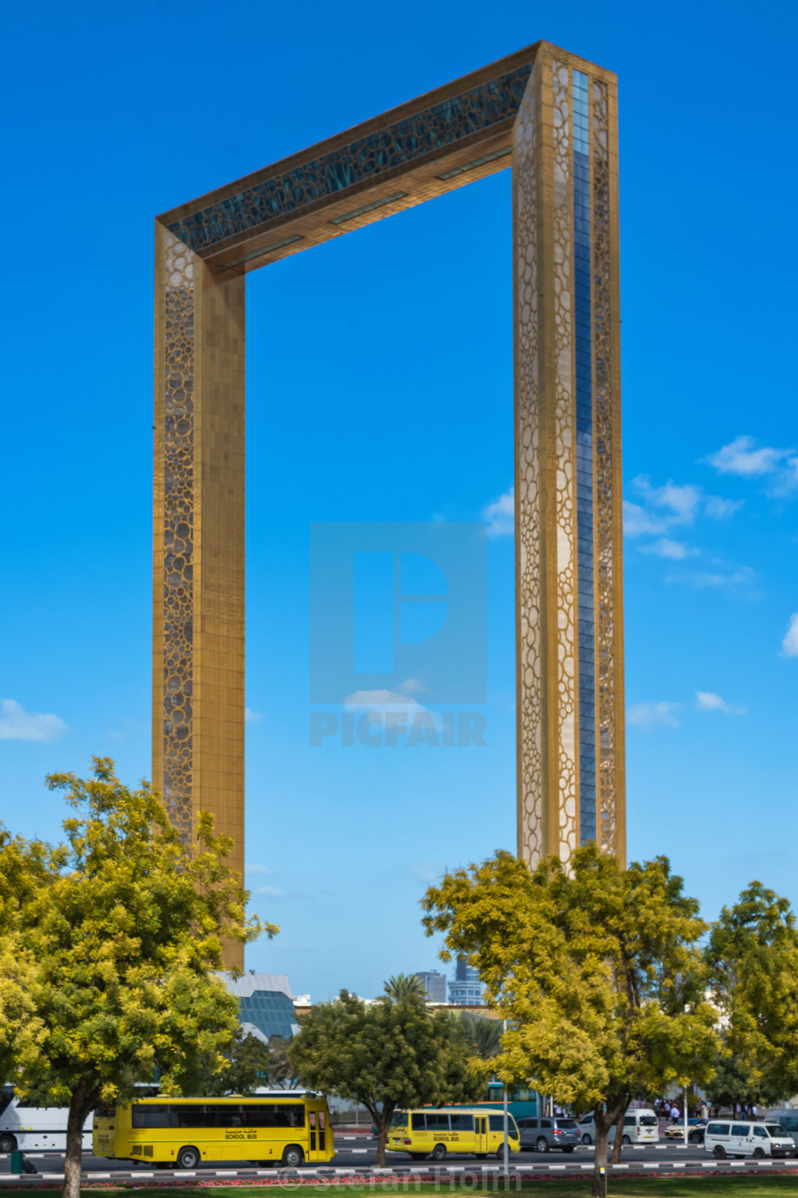 "Dubai frame with its golden color rises inbetween the old and ne" by Stefan Holm - $6.32 "Dubai frame with its golden color rises inbetween the old and ne" stock image