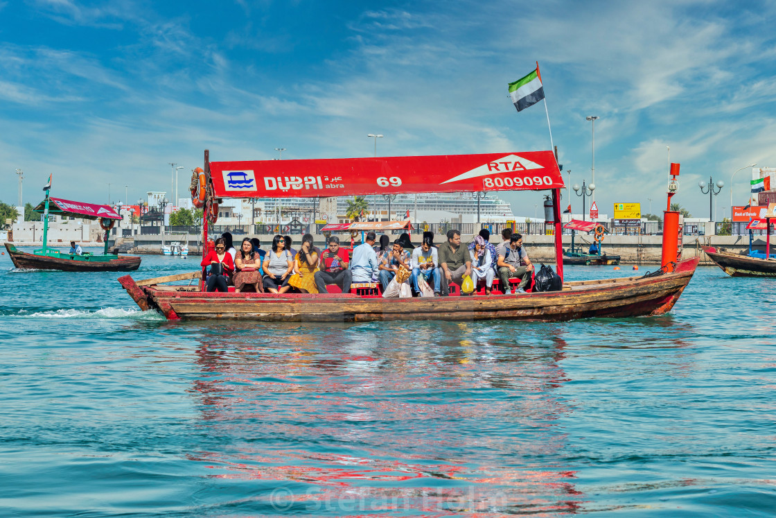 "Crowded taxi boats crossing the Dubai Creek between Deira and Al" by Stefan Holm - $6.34 "Crowded taxi boats crossing the Dubai Creek between Deira and Al" stock image