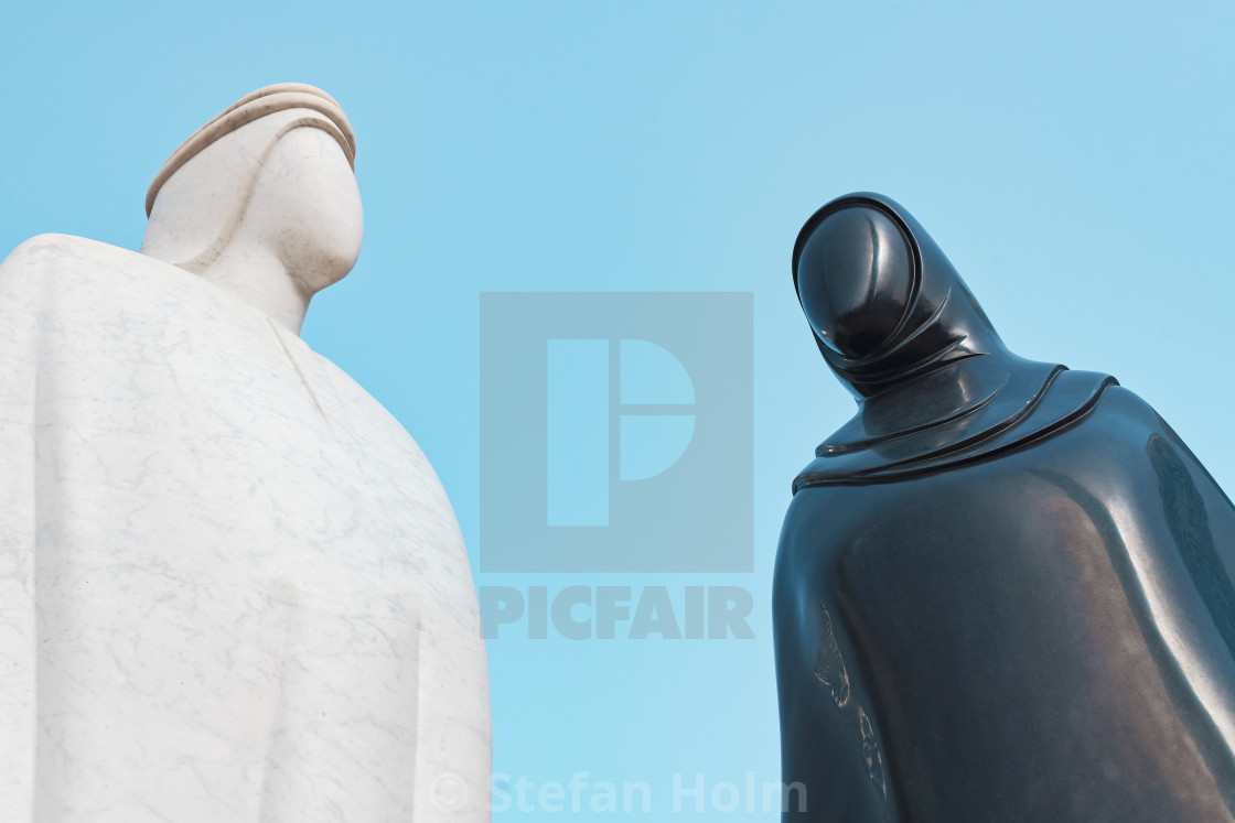 "Statue TOGETHER outside Dubai mall and Burj Khalifa with a blue" by Stefan Holm - $6.30 "Statue TOGETHER outside Dubai mall and Burj Khalifa with a blue" stock image