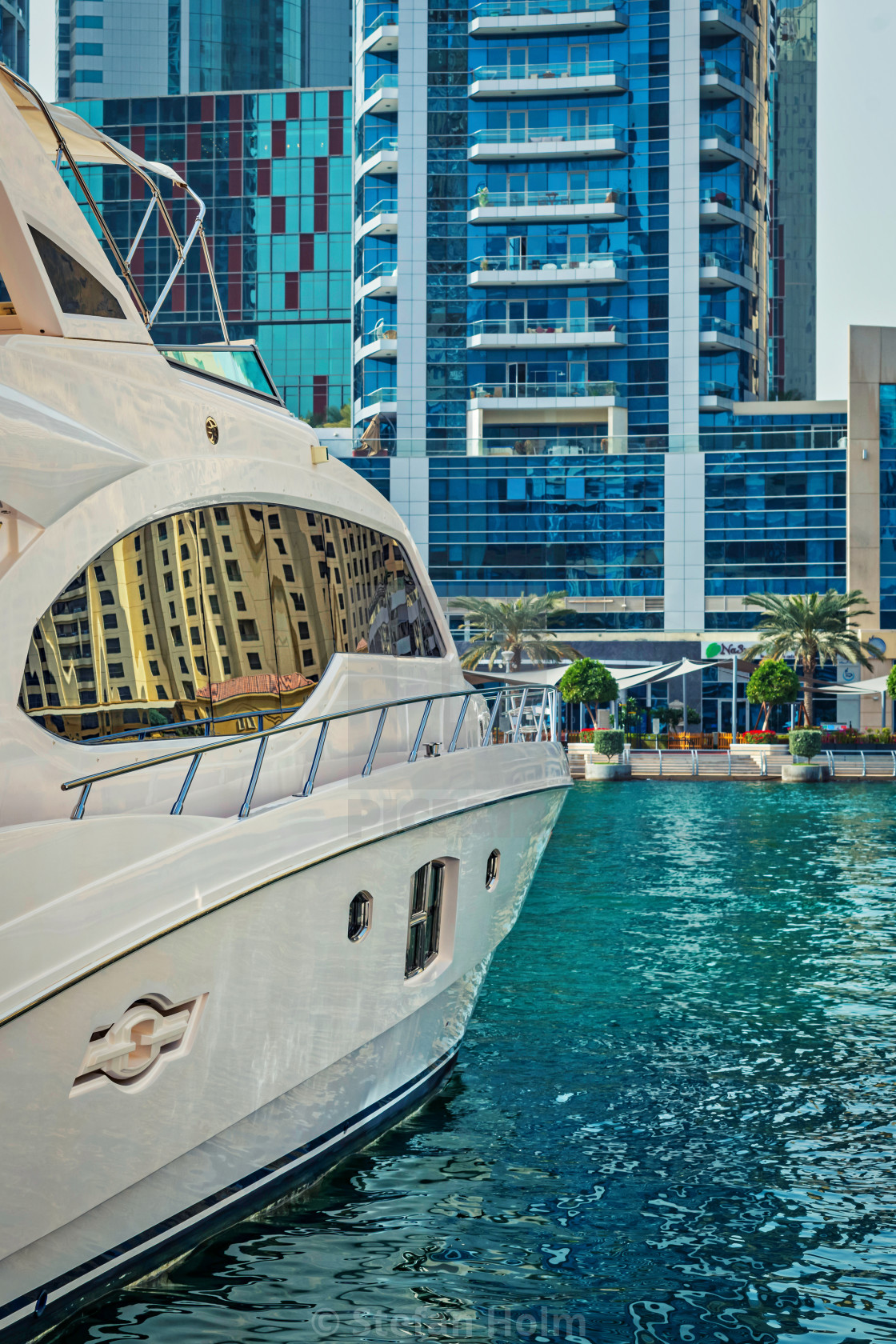"Side of a yacht with reflections of buidings in the toned window" by Stefan Holm - $6.32 "Side of a yacht with reflections of buidings in the toned window" stock image